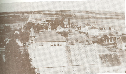 Vue-aerienne-dune-partie-du-village-de-Bearn-vers-1940.png